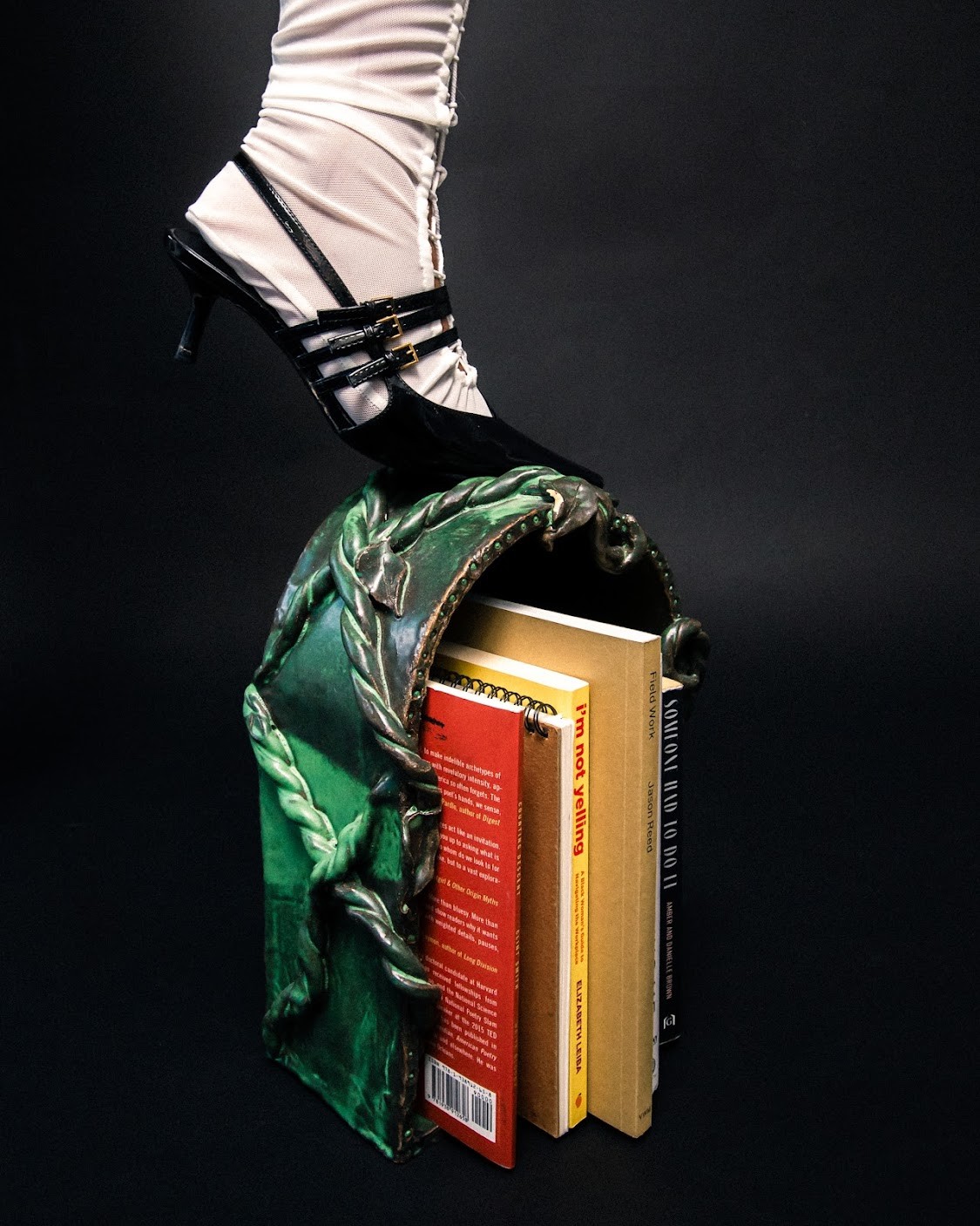 Woman with sunglasses walking down runway