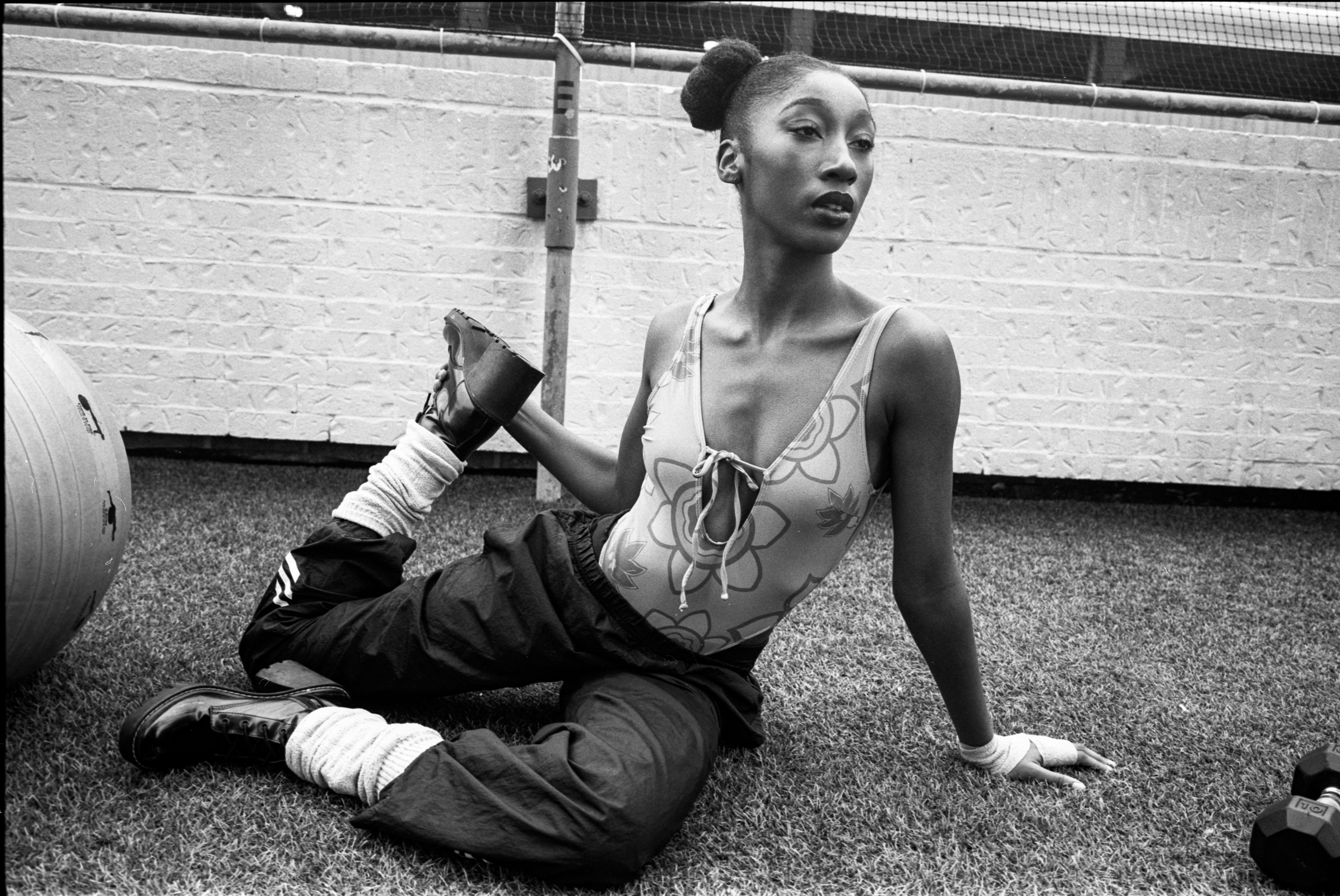 Woman with sunglasses walking down runway