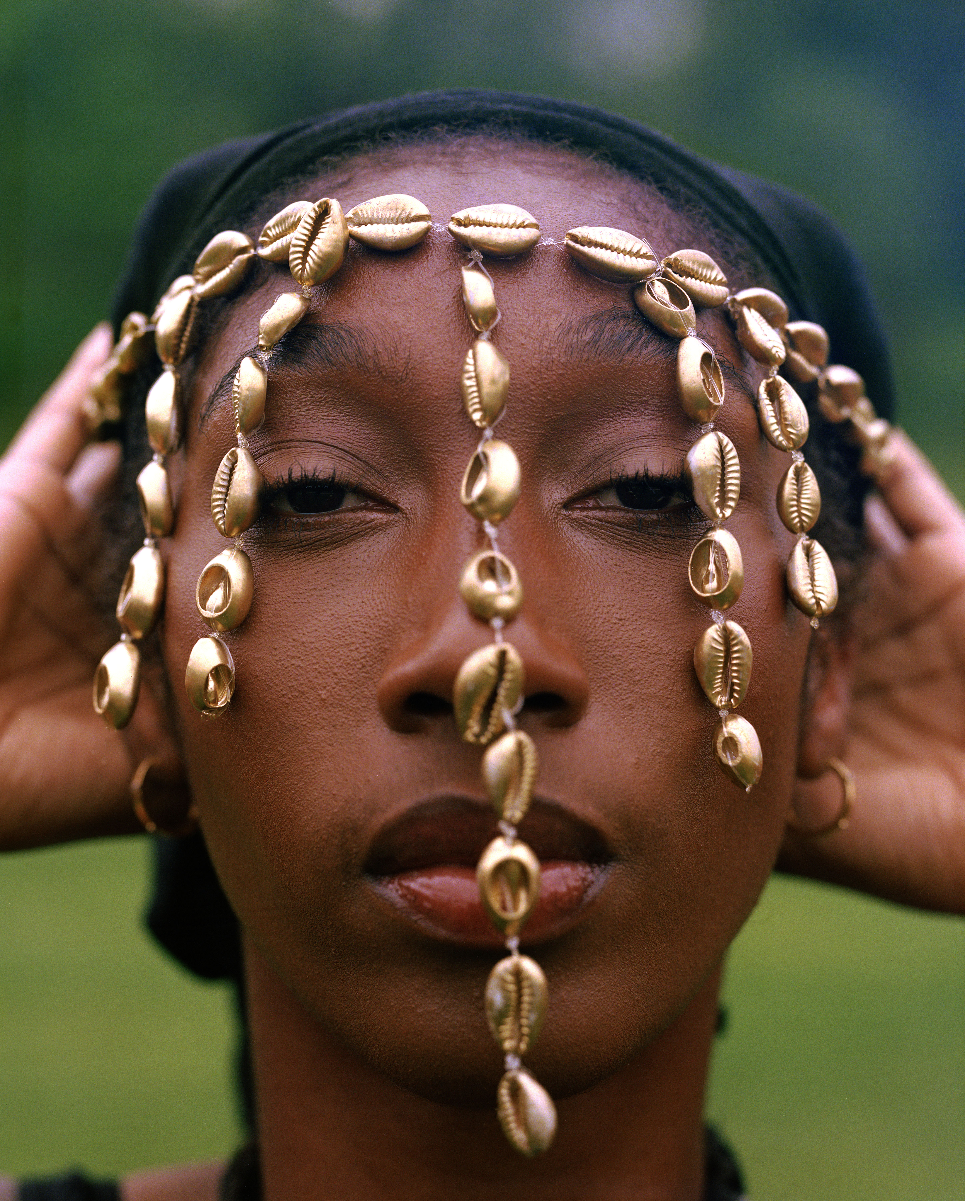 Side profile portrait under a dark veil