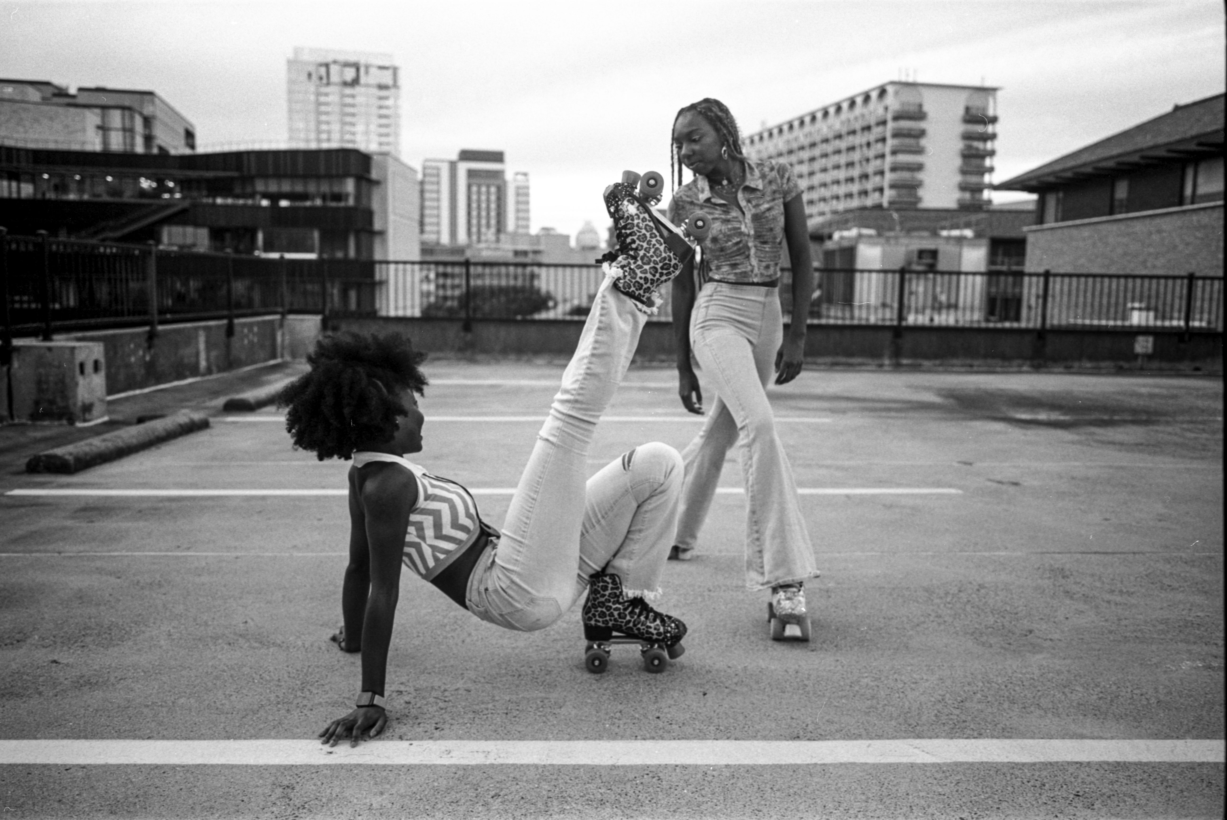 Woman with sunglasses walking down runway