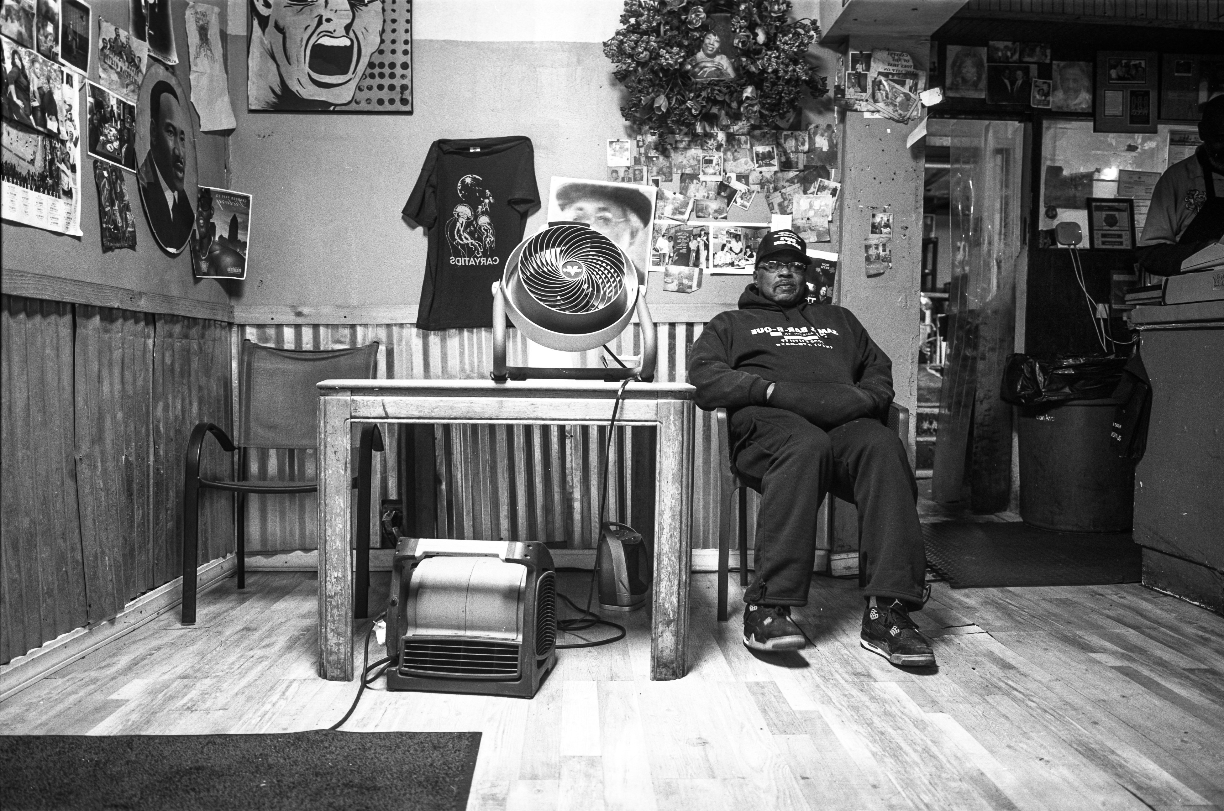 Woman with sunglasses walking down runway