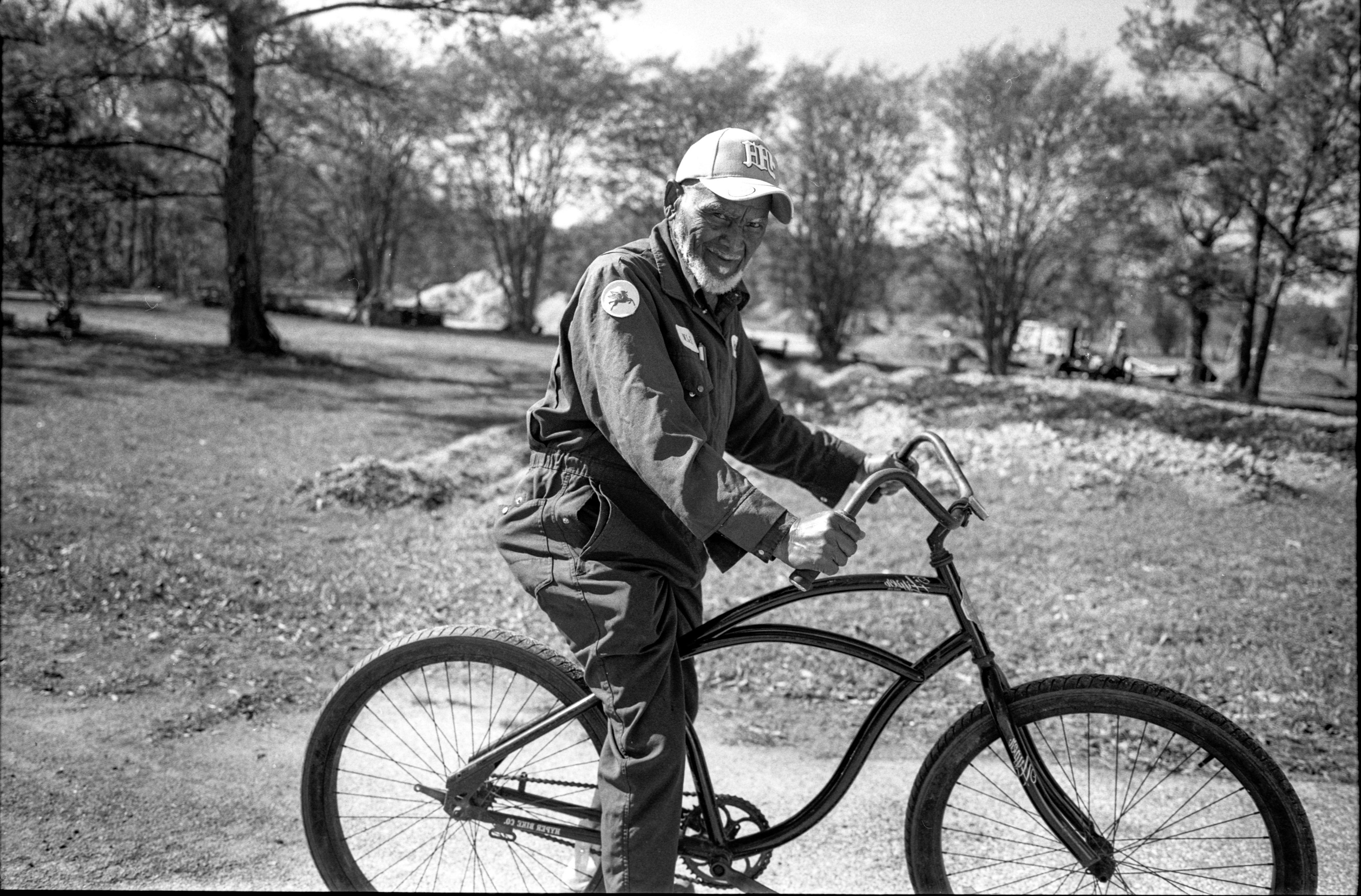 Woman with sunglasses walking down runway